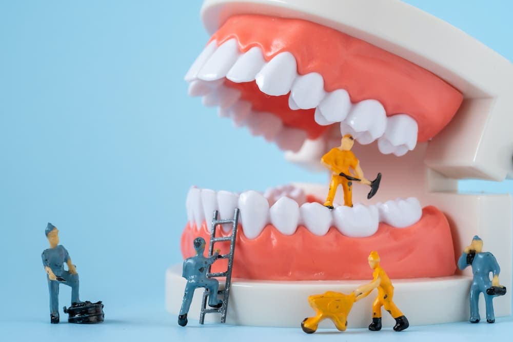 Dentist explaining restorative treatment options to a patient