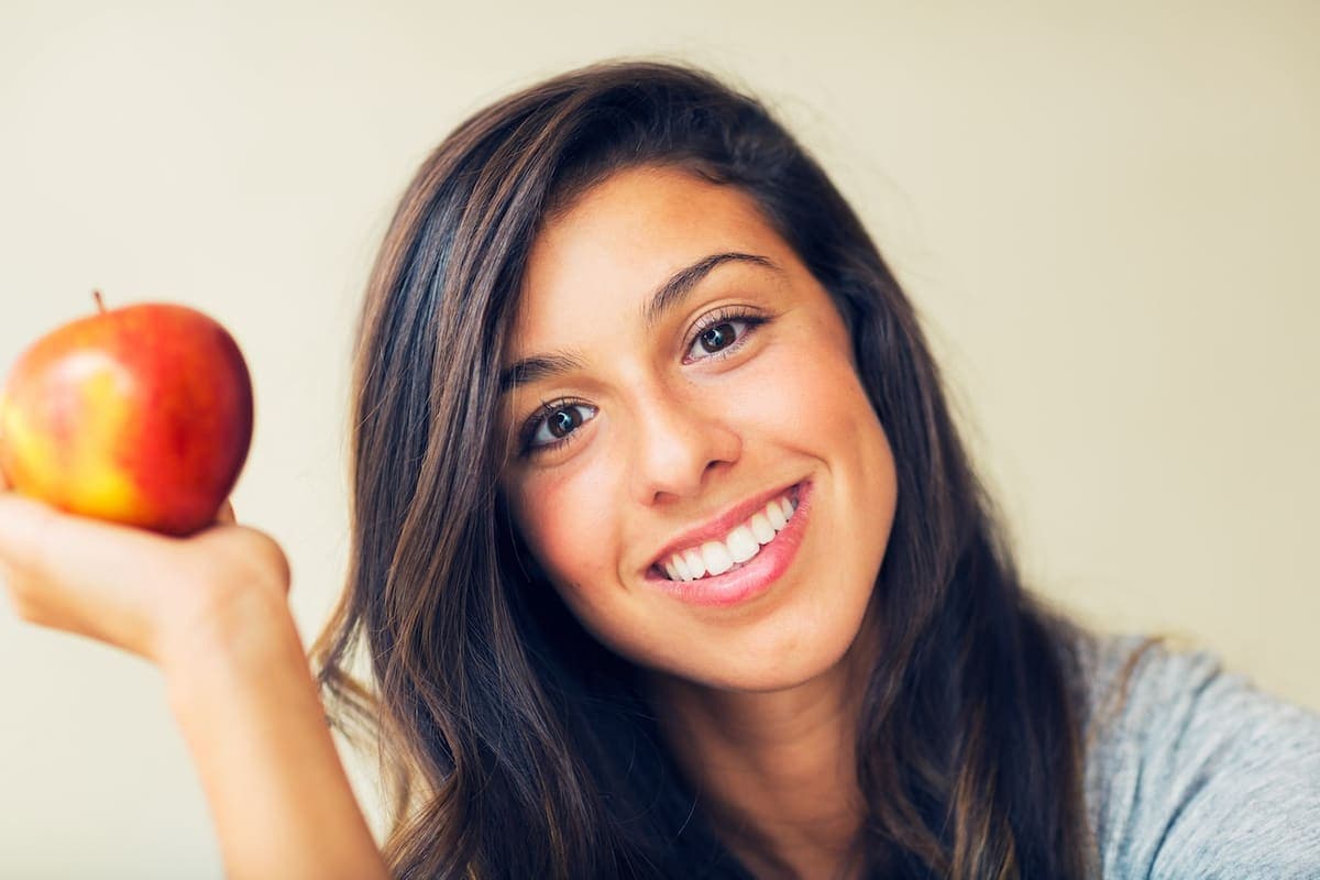 Healthy smile representing the link between oral and overall health
