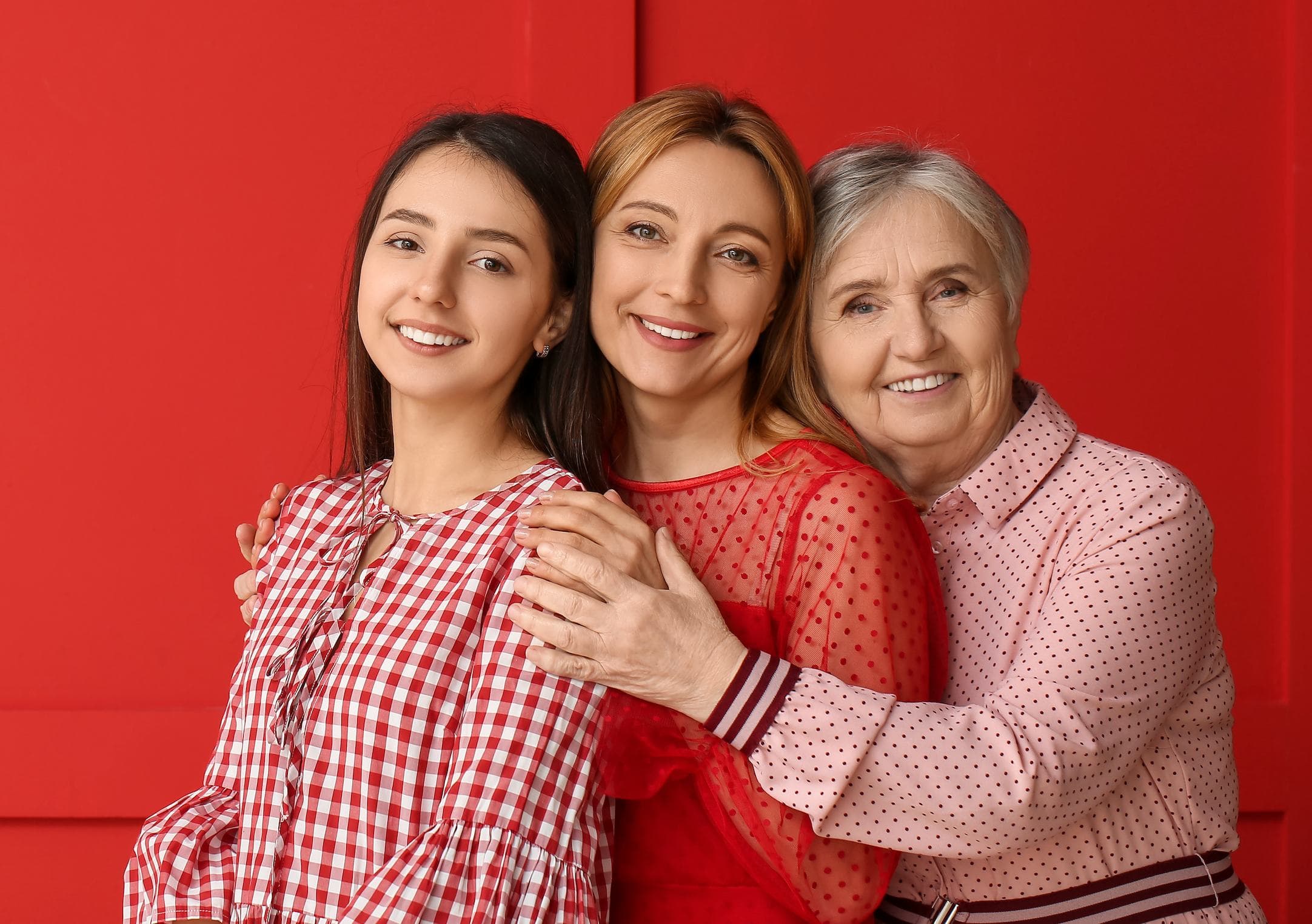 Three generations of family smiling at Advanced Dental Care Leesburg